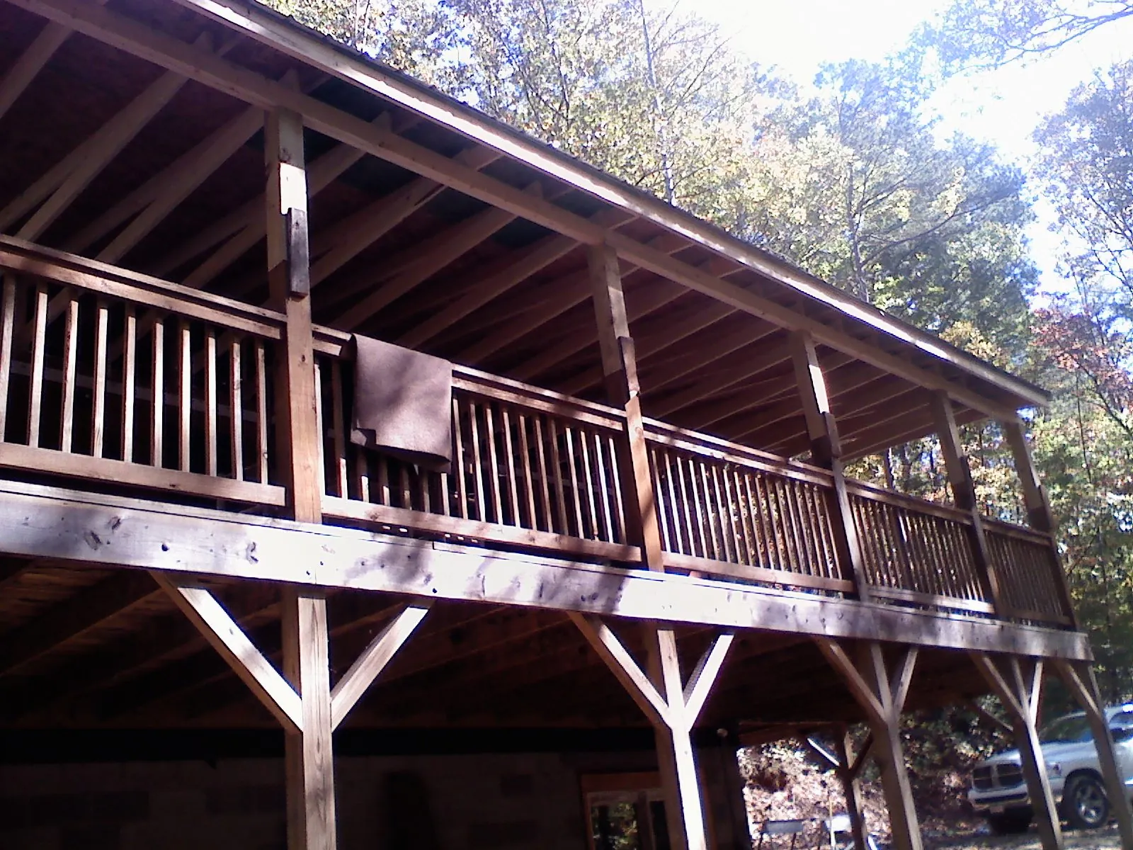 Timber framing under a new elevated porch and deck — Roof Leak Repair in Stewartstown by Roofing Brothers